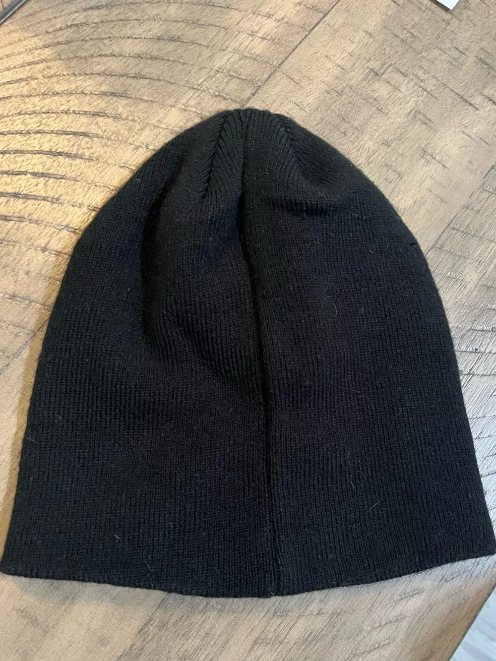 Amazon Black Knit Beanie with White Logo and Blue Arrow.  0004